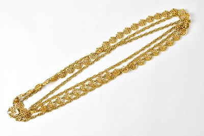 Lot 734 - TRIFARI; a three-strand gold-coloured chain...