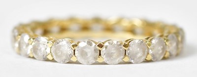 Lot 695 - A 14ct yellow gold ring set with cubic...