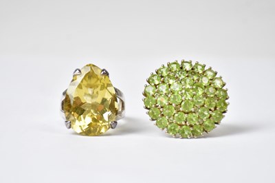 Lot 709 - A gold-coloured 925 silver ring set with green...