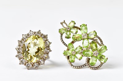 Lot 708 - A 925 silver ring set with an oval green stone...