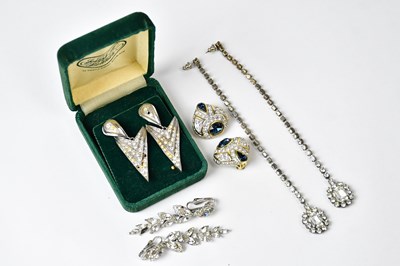 Lot 712 - A pair of 925 silver drop earrings set with...
