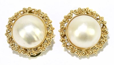 Lot 1492 - A pair of 14ct yellow gold and mabe pearl ear...