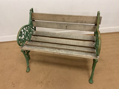 Lot 852 - A Coalbrookdale style cast iron ended green...