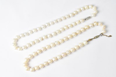 Lot 720 - Four single-strand pearl necklaces, each with...