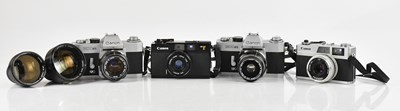 Lot 2362 - CANON; four 35mm film cameras, to include two...