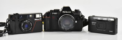 Lot 2371 - NIKON; three 35mm film cameras, to include a F-...
