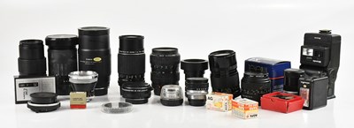 Lot 2372 - A collection of camera lenses and accessories,...