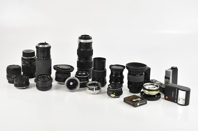 Lot 2370 - A collection of camera lenses and accessories,...
