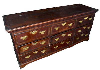 Lot 1679 - A Georgian oak and mahogany crossbanded mule chest
