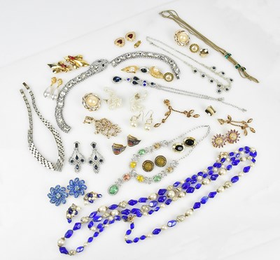 Lot 385 - TRIFARI; a four strand blue bead and faux...