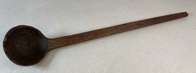 Lot 61 - A large turned elm wood skimming ladle, length...