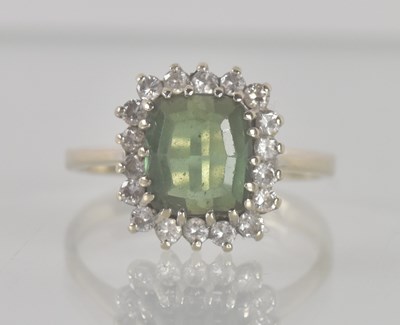 Lot 1220 - An 18ct white gold tourmaline and diamond...