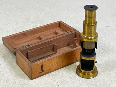 Lot 84 - A c1900 walnut cased simple lacquered brass...