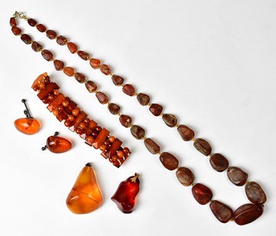 Lot 992 - A group of amber jewellery, comprising two...