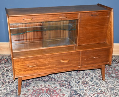 Lot 1431 - G-PLAN; a mid century teak sideboard with an...
