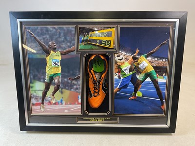 Lot 136 - USAIN BOLT; a signed Puma running shoe, box...