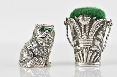 Lot 529 - A novelty pin cushion in the form of a cat,...