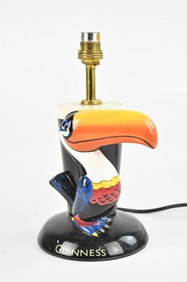 Lot 2330 - ENESCO; a Guinness toucan lamp, height 27cm,...