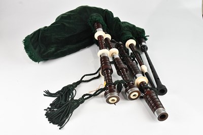 Lot 2388 - A set of cased practice bagpipes.