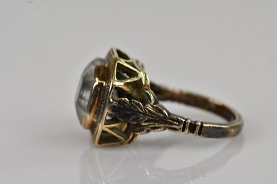 Lot 2390 - A yellow metal dress ring, stamped '9c', set...