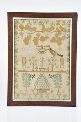 Lot 1224 - A 19th century sampler, with floral decoration...