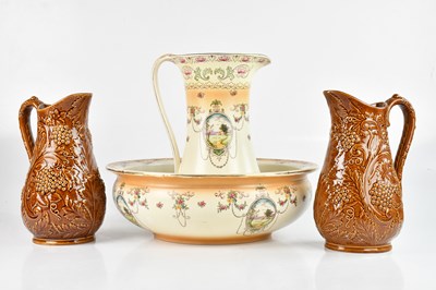 Lot 1250 - A pair of brown glazed Portmeirion pottery...