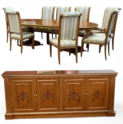 Lot 2104 - A modern inlaid birch and maple oval dining...