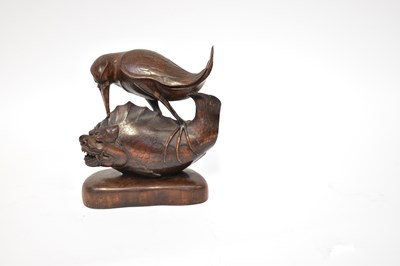 Lot 221 - A late 19th/early 20th century carved wooden...