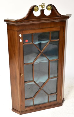 Lot 92 - A Georgian mahogany glazed corner cupboard...