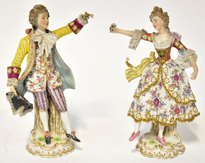 Lot 140 - CAPODIMONTE; a pair of figures of an 18th...