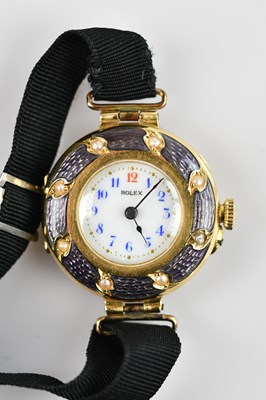 Lot 469 - ROLEX; an early 20th century 9ct gold, enamel...
