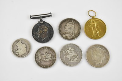 Lot 1147 - A collection of coins comprising an 1883 half...
