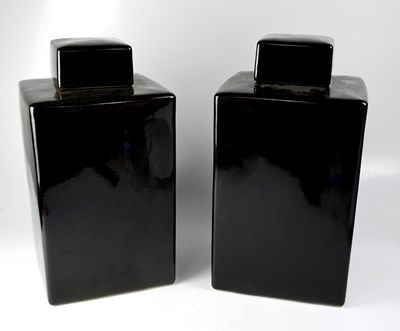 Lot 265 - A pair of square-form covered ginger jars with...