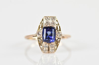 Lot 2601 - An Art Deco white metal sapphire dress ring,...