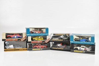 Lot 1609 - SCALEXTRIC; a collection of eight vehicles...