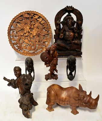 Lot 223 - Various Eastern carvings including a pierced...