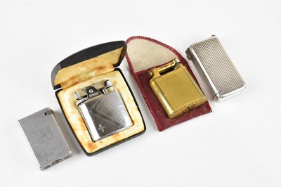 Lot 2279 - A collection of four lighters comprising a...