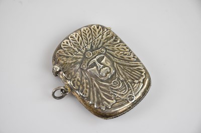 Lot 533 - A sterling silver vesta case with embossed...