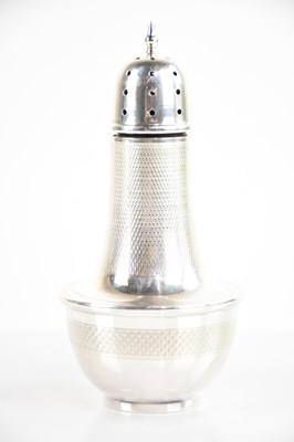 Lot 343 - A hallmarked silver sugar caster, with engine...