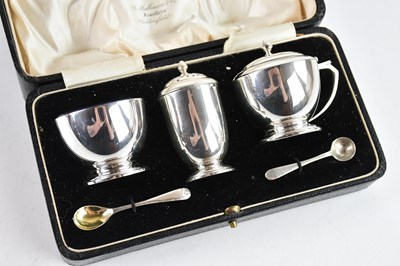 Lot 329 - A cased hallmarked silver three piece cruet,...