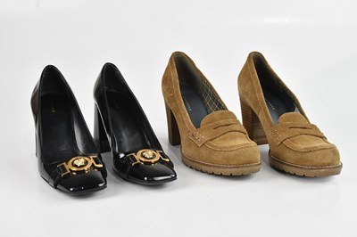 Lot 364 - VERSACE; a pair of black patent leather court...