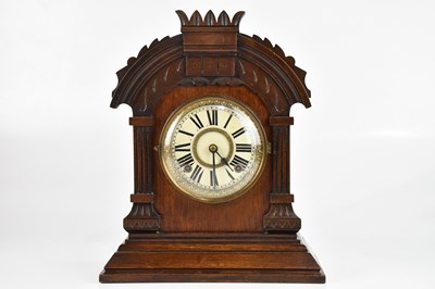 Lot 2183 - ANSONIA; an American darkwood mantel clock,...