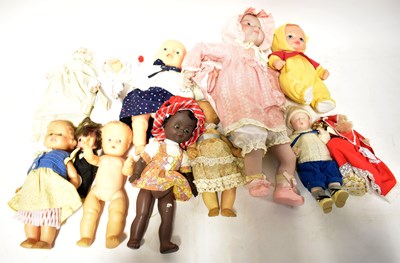 Lot 319 - A quantity of mid-20th century and later dolls,...