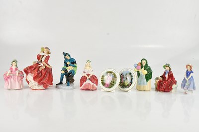 Lot 1307 - ROYAL DOULTON; a group of five Doulton ladies...