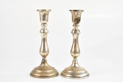 Lot 59 - A pair of sterling silver weighted...