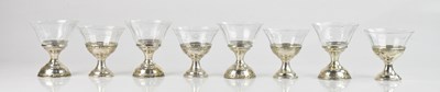 Lot 567 - A set of eight etched glass dessert sherbert...