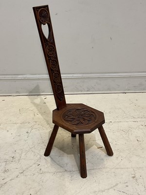 Lot 2081 - A carved oak spinning chair.