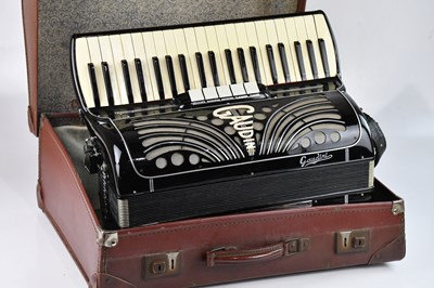 Lot 2389 - GAUDINI; a cased piano accordion.