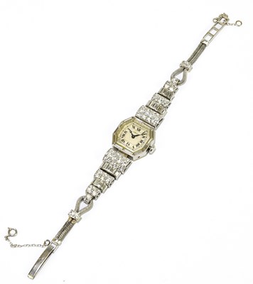Lot 1627 - CARTIER; a fine lady's white metal and diamond...