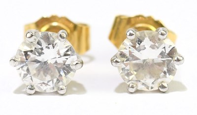 Lot 1477 - A pair of 18ct yellow gold diamond single...